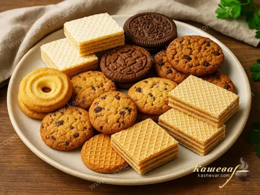 Different types of cookies and waffles on a plate