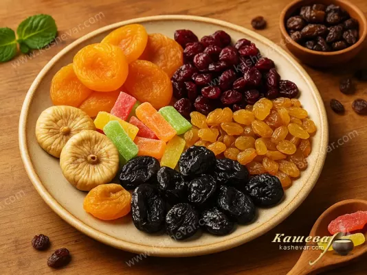 Different types of dried fruits and candied fruits on a plate