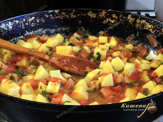 Potatoes stewed with tomatoes and spices