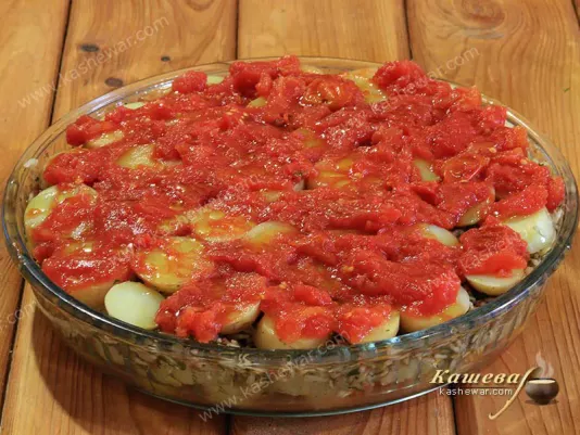Tomatoes on top of potatoes