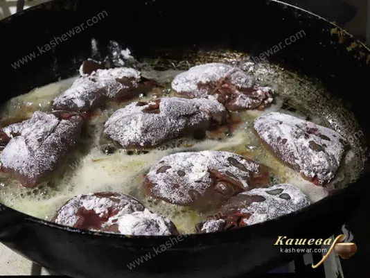 Beef liver in a frying pan