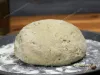Dough for onion bread on a baking sheet
