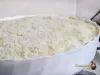 Grated cheese on moussaka