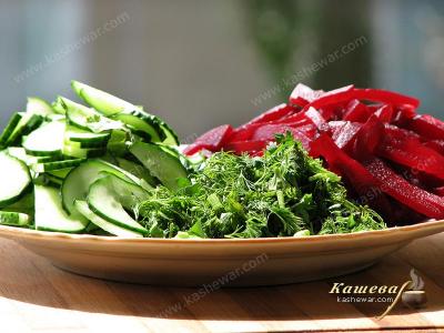 Cutting vegetables and herbs for borsch