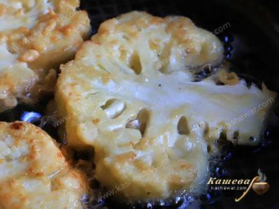Cauliflower in a pan with butter