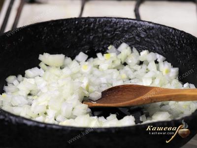 Finely chopped onion in a skillet